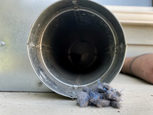 East Rancho Dominguez Dryer Vent Cleaning technician using specialized equipment to clear severe dryer vent blockage in East Rancho Dominguez